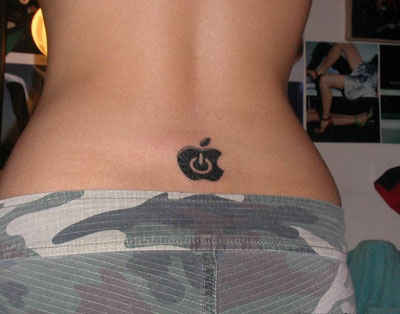 Swirled girl tattoo back body. Tattooing has been practiced worldwide.